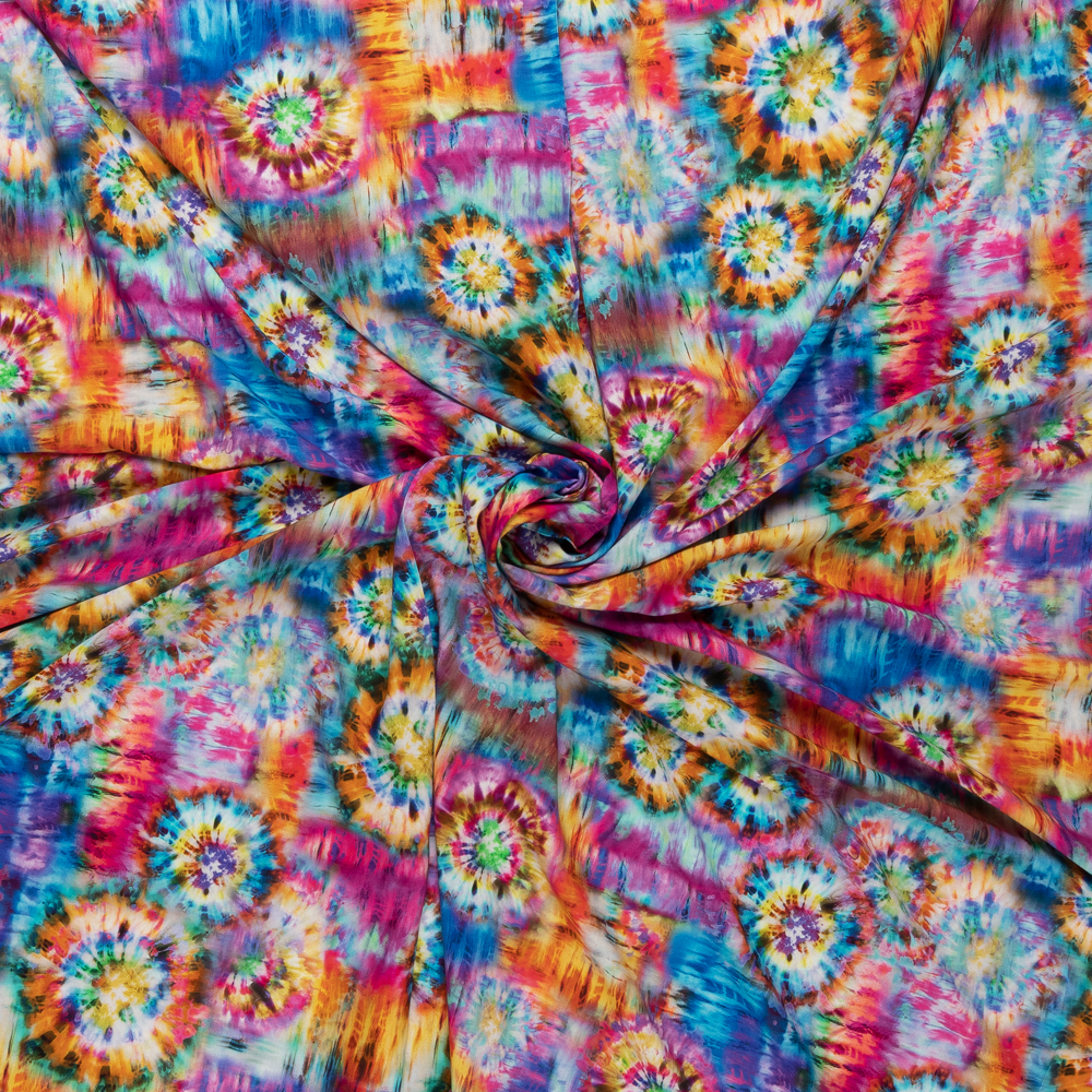 viscose met aqua cerise geel batiklook inkjet print Italiaans import