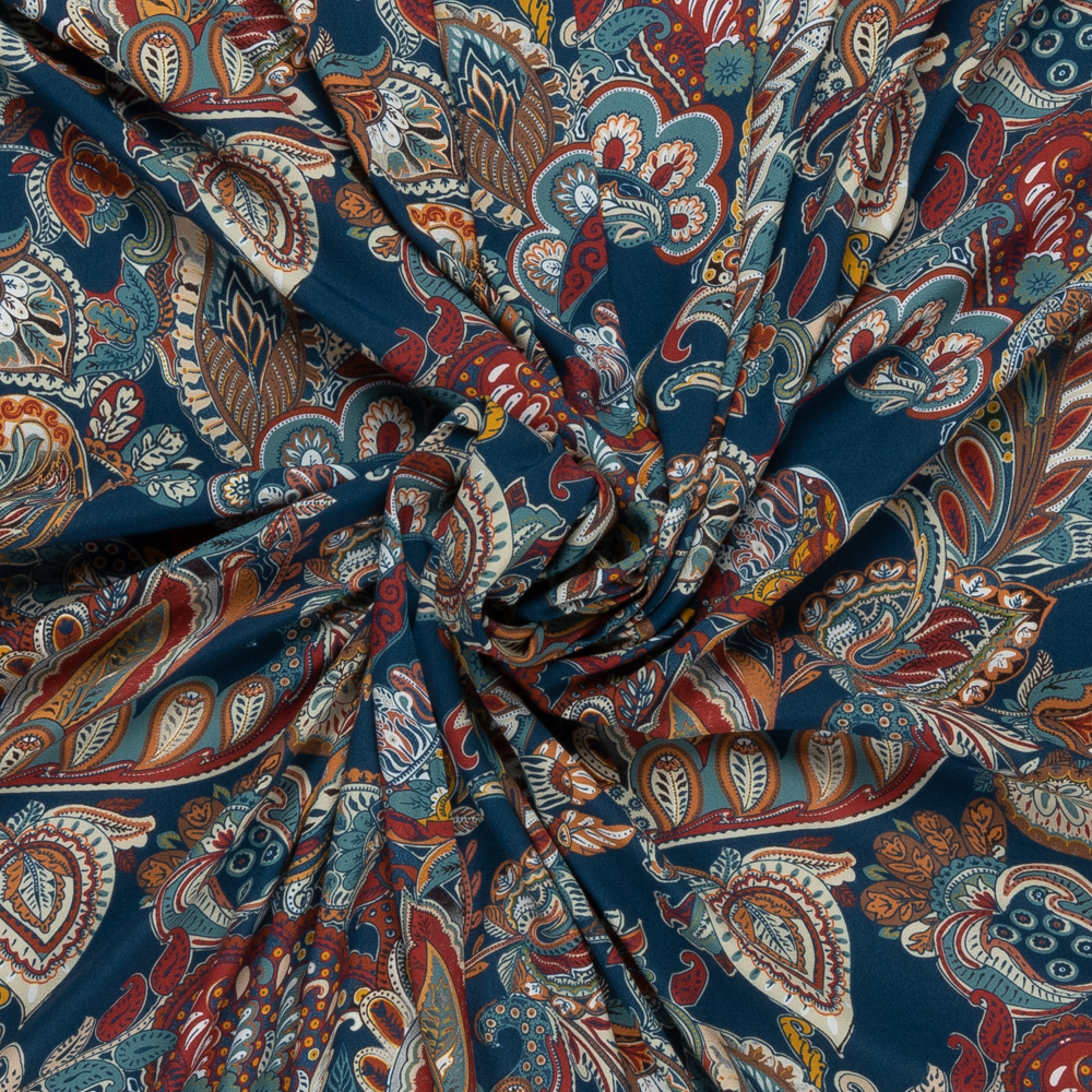 petrol blauw viscose met brique oker paisley dessin italiaans import