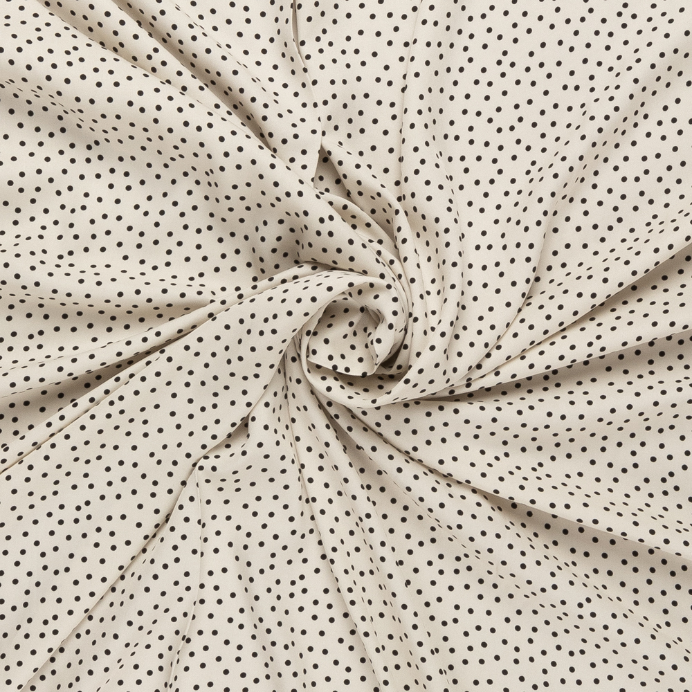 creme viscose twill met zwart fijn stip dessin