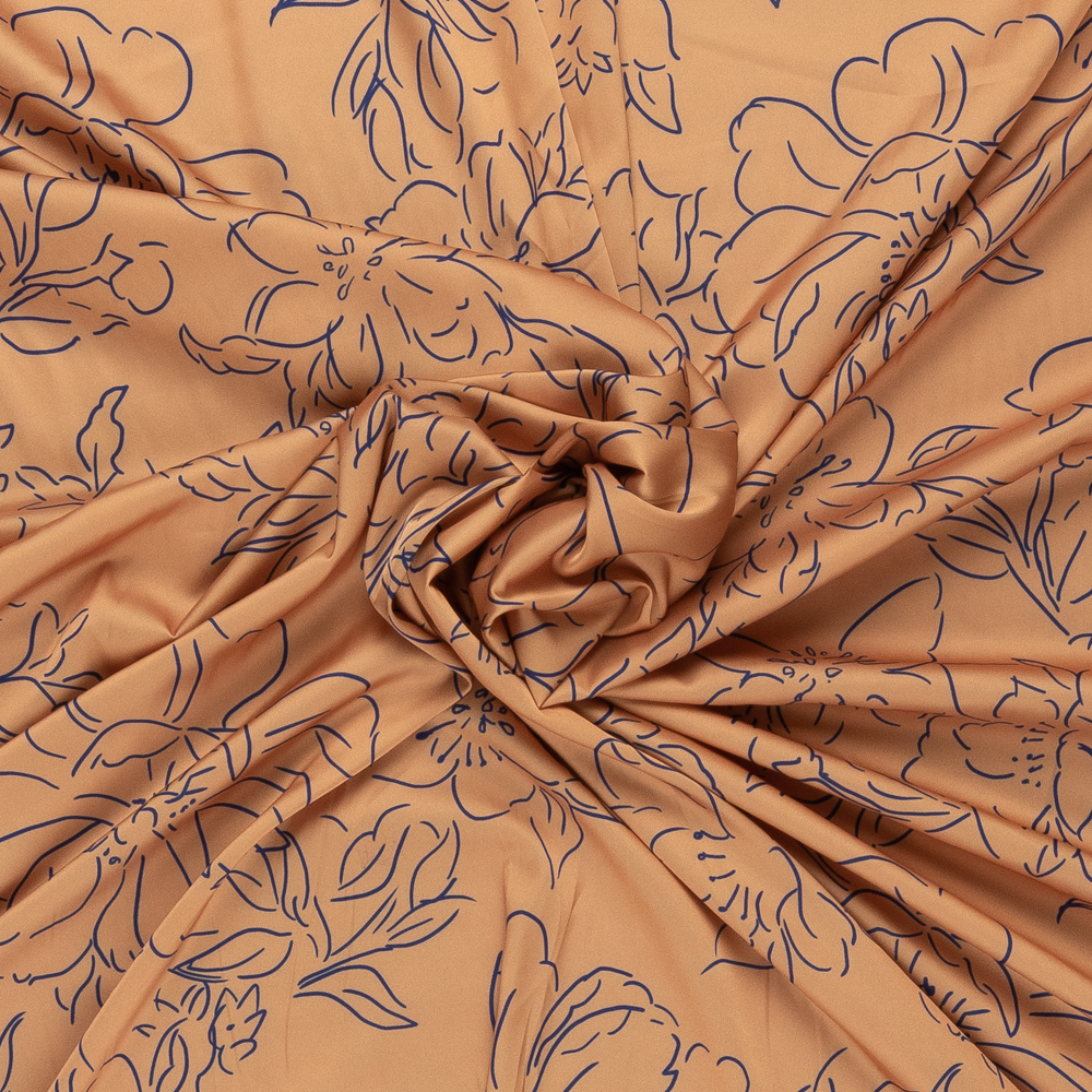 soft oranje satijn met blauw getekend bloem dessin italiaans import