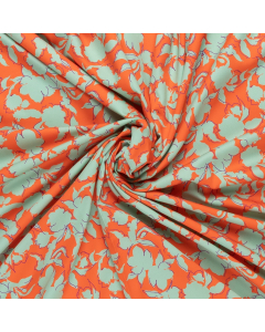 oranje satijnen stof met mintgroen abstract bloemdessin