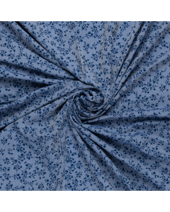 denim blauw viscose jeans optiek stof met koningsblauw bloemetjes dessin