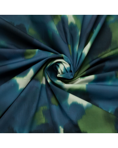 beige kaotenbatist stof met blauw groen abstract aquarelbloemenpatroon