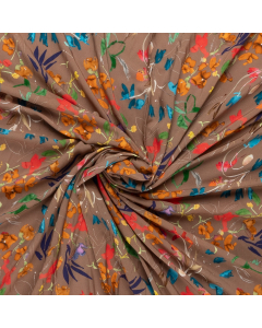 bruin viscose stof met oranje rood paars veldbloem dessin