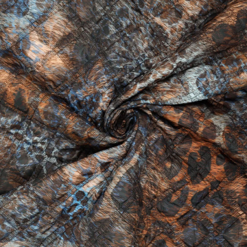 bruin blauw  gestepte stof met animal bedrukking