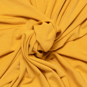 mosterd geel stretch tricot van bamboe