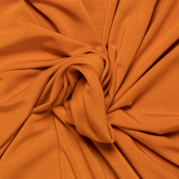 rusty oranje stretch tricot van bamboe