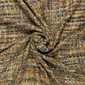 okergeel blauw camel couture bouclé stof Italiaans import