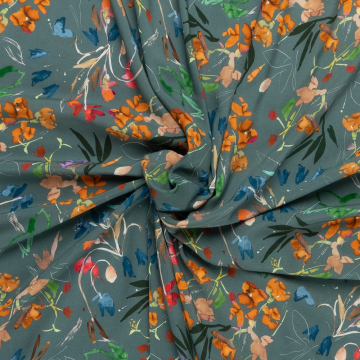 petrol viscose stof met oranje rood blauw veldbloem dessin