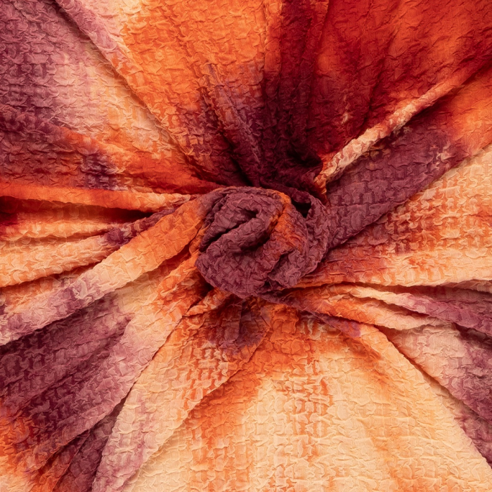 Böttger Stoffenwinkel - creme oranje rood tie an dye cloqué stretch jersey stof Italiaans import - 65476