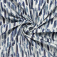 gebroken wit stretch denim stof met batik blauw vegen dessin