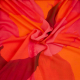 Böttger Stoffenwinkel - oranje fuchsia rood viscose stof met abstract bloem dessin - 62795