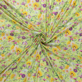 Fashion Trends lentegroen katoen batist met lila geel wit bloem dessin