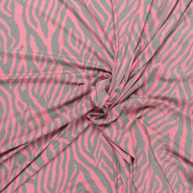 grijs roze stretch tricot met grillig fantasie dessin bedrukt