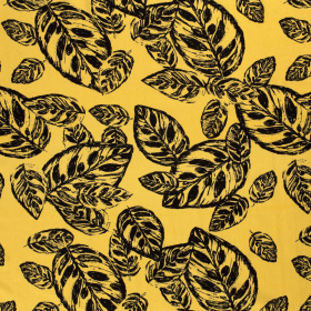 geel linnen viscose met zwart royaal blad dessin bedrukt