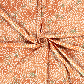 room stretch tricot met soft oranje groen fantasie dessin