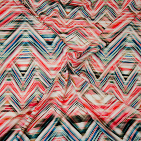 stretch tricot met beige roze blauw zigzag streep italiaans import