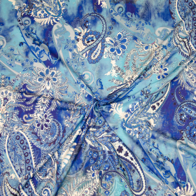 blauw viscose stretch tricot met kobalt aubergine paisley dessin italiaans import