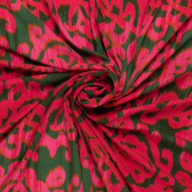 groen crepe viscose met fuchsia azteken dessin Italiaans import