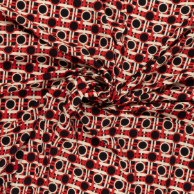 zwart viscose stof met ecru rood grafisch dessin