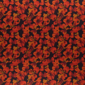 zwart stretch denim stof met oranje gele bladeren