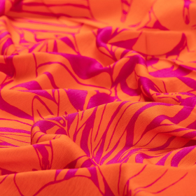 oranje, fuchsia crepe viscose mix stof met bladdessin
