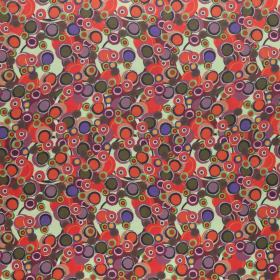 zachtgroen georgette stof met rode en paarse stippen Italiaans import