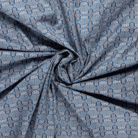 donker blauw stretch satijnkatoen stof met blauw wit grafisch dessin
